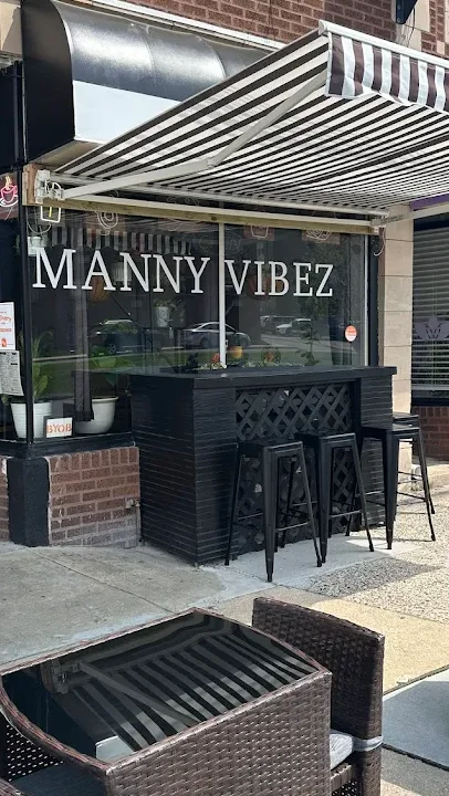 Outdoor seating area of Manny Vibez restaurant