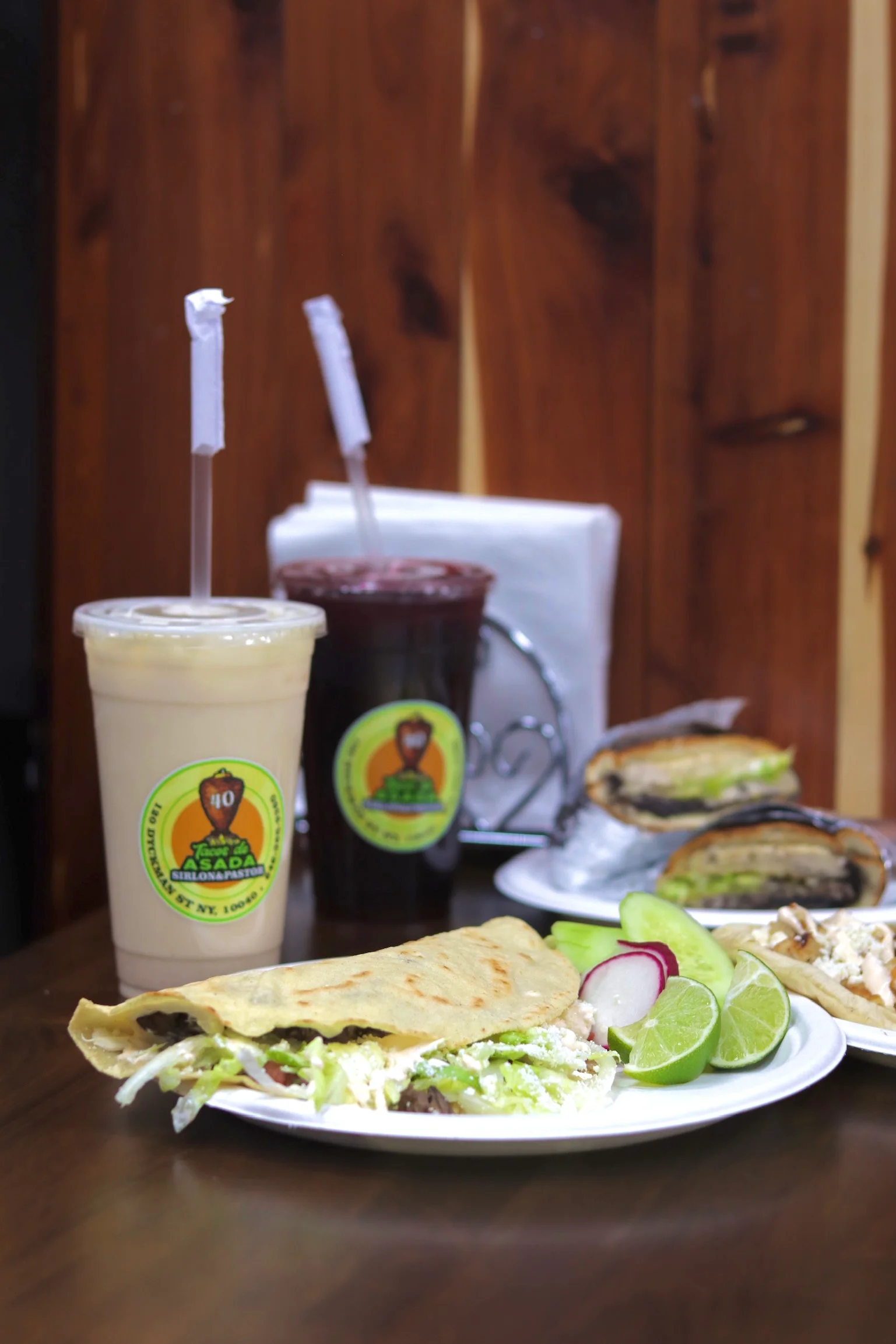 Delicious Mexican tacos with fresh toppings and beverages