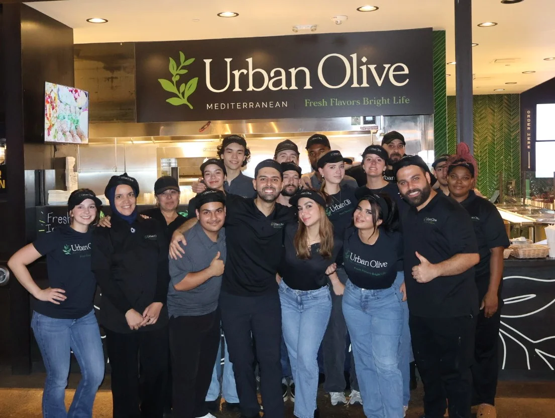 Urban Olive restaurant team celebrating together