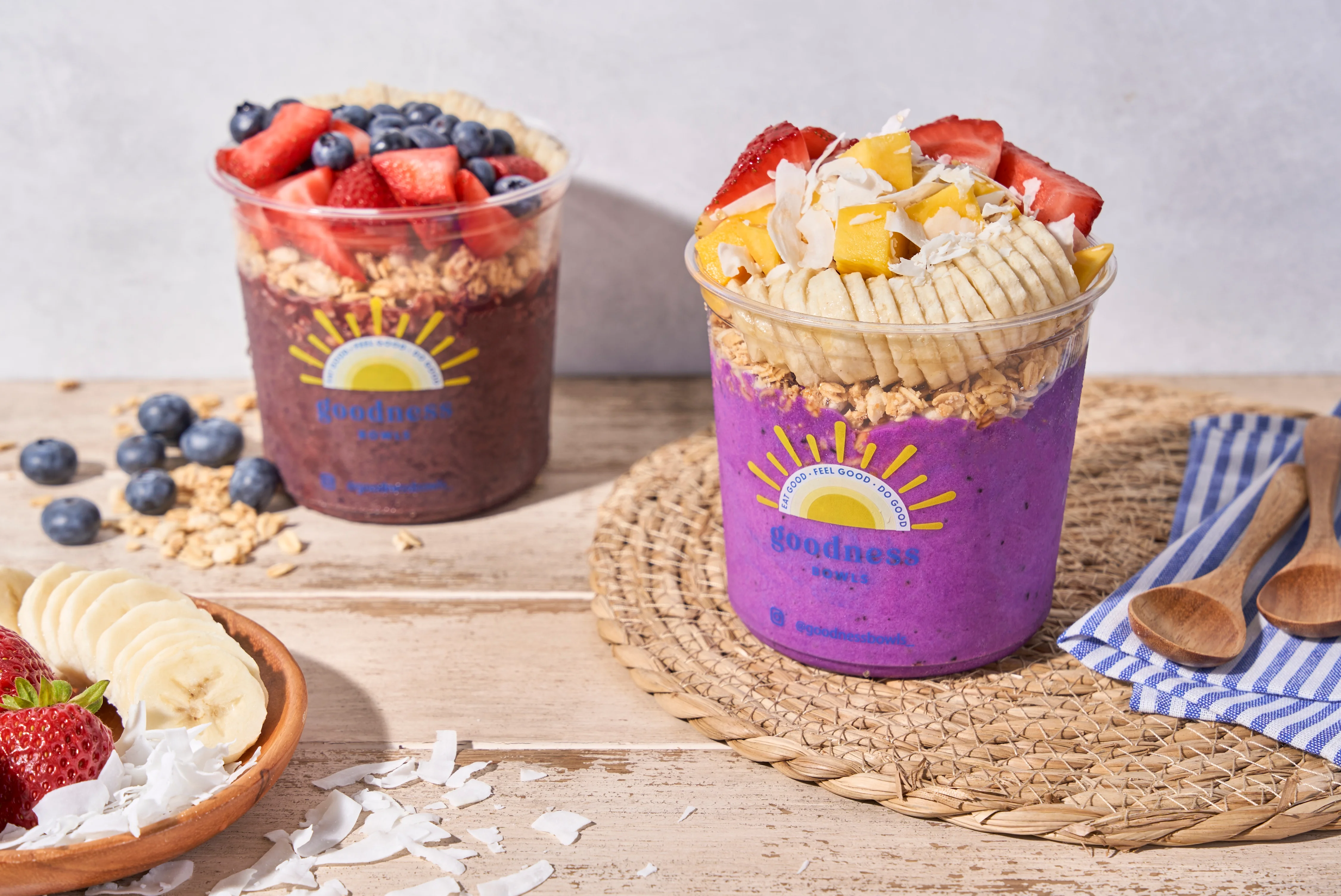 Colorful smoothie bowls with fresh fruit toppings