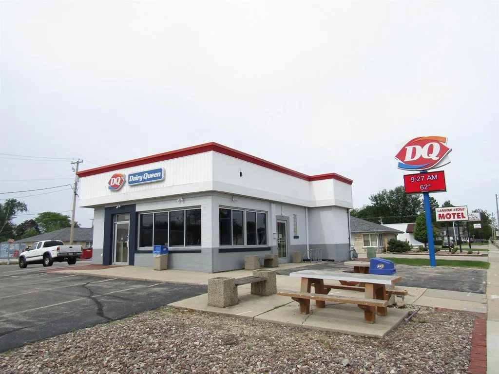 Dairy Queen restaurant exterior with signage and outdoor seating