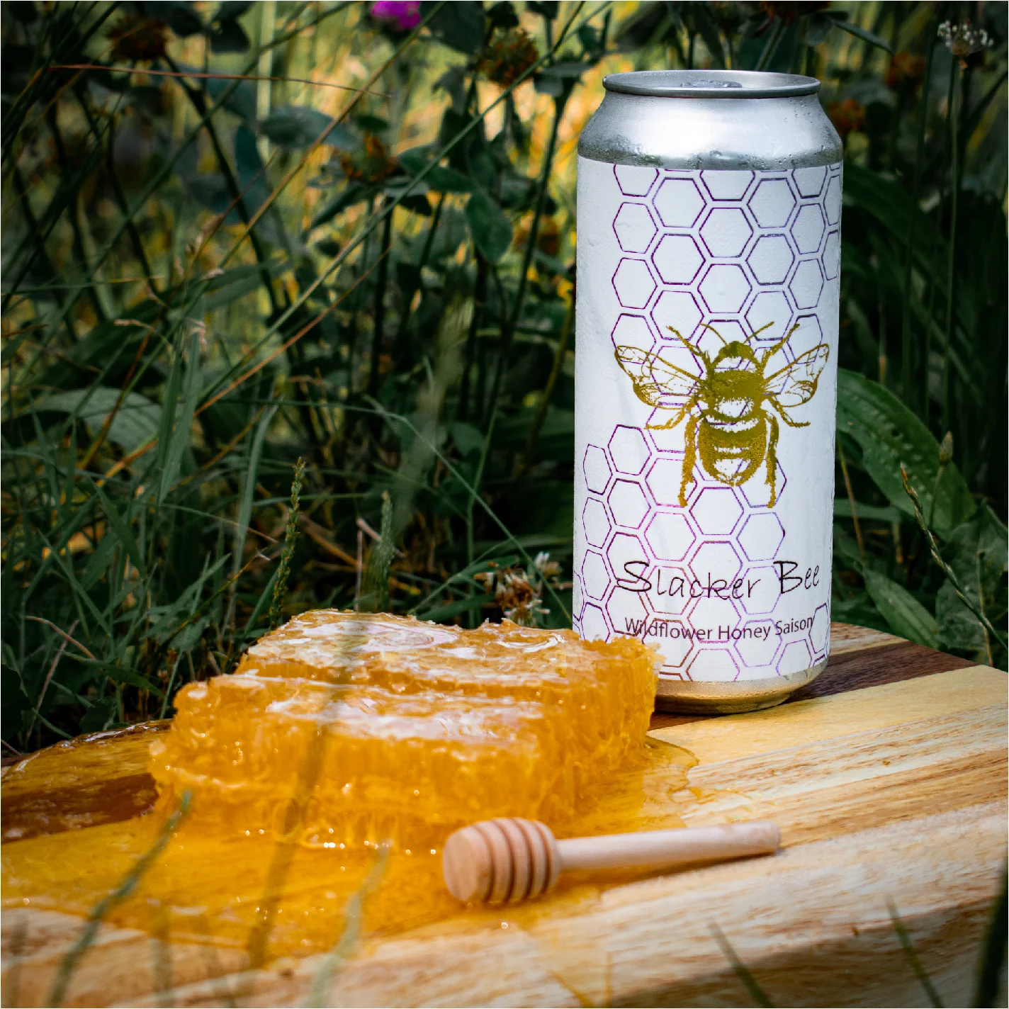 Can of Wildflower Honey Saison beer with honeycomb