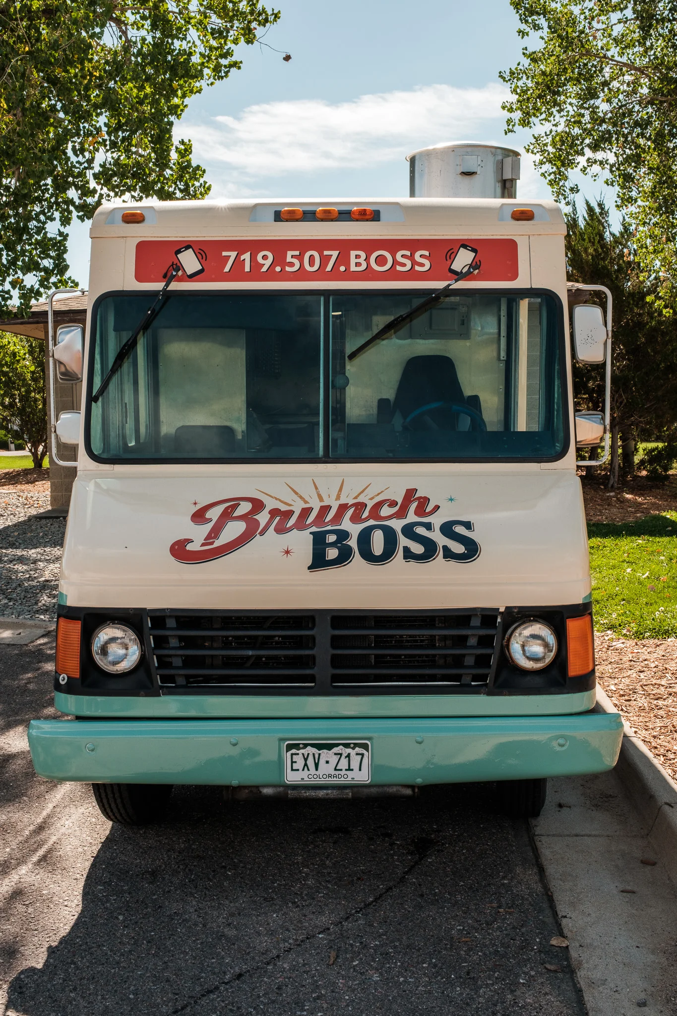 Brunch food truck with vibrant branding and cheerful atmosphere