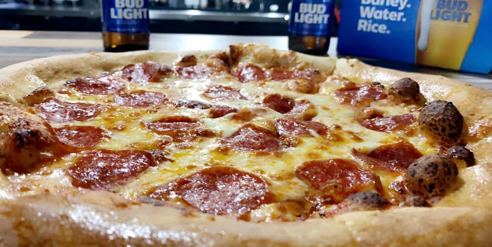 Pepperoni pizza with a golden crust and melted cheese