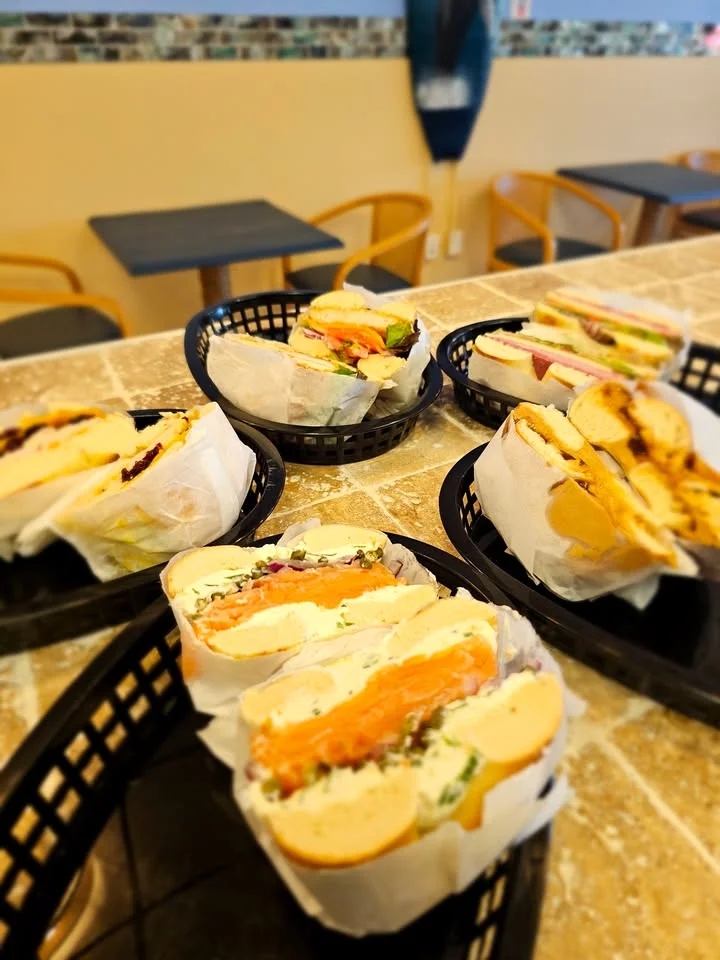 Assorted sandwiches in a cozy café setting