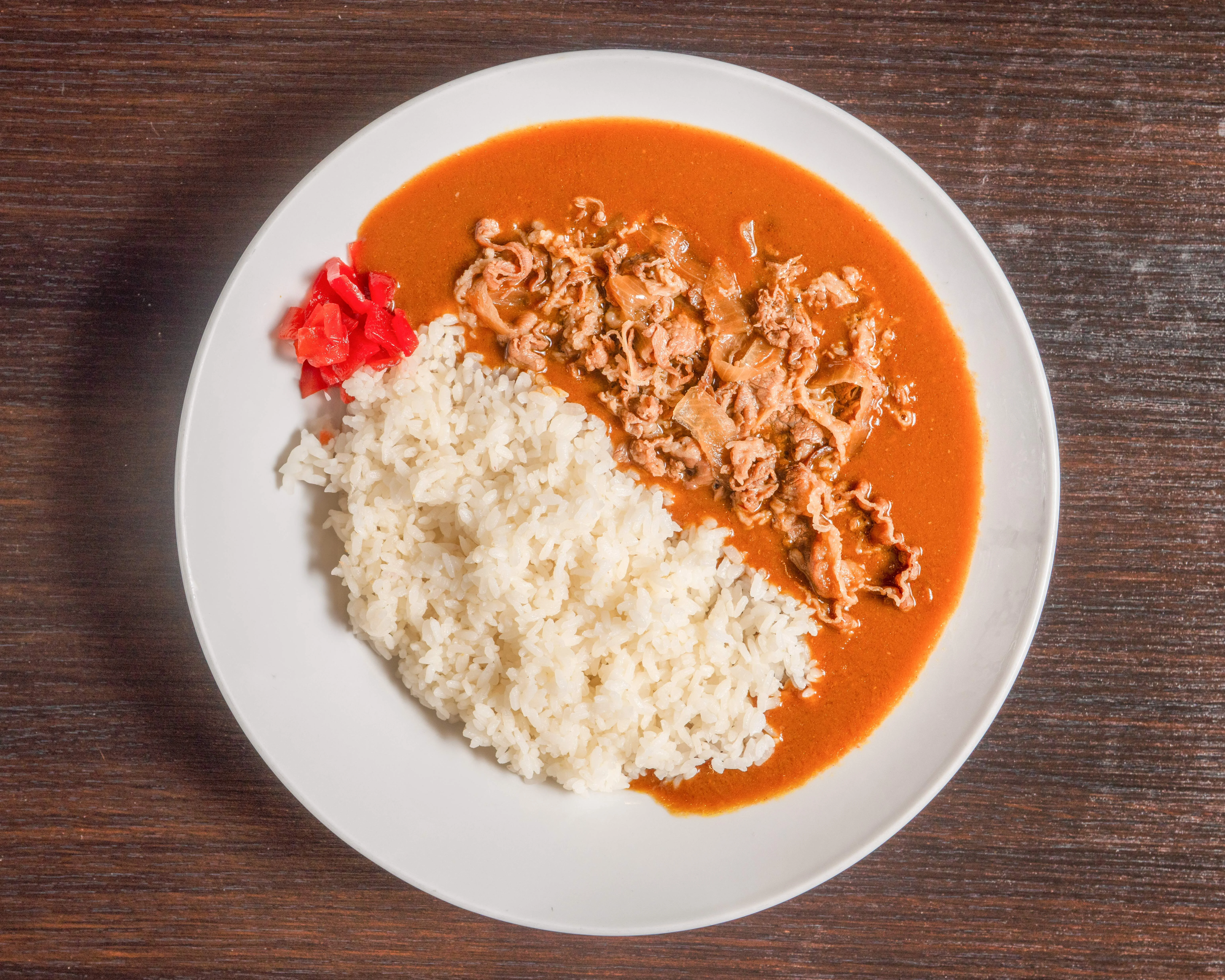 Japanese curry rice with tender beef and pickled ginger