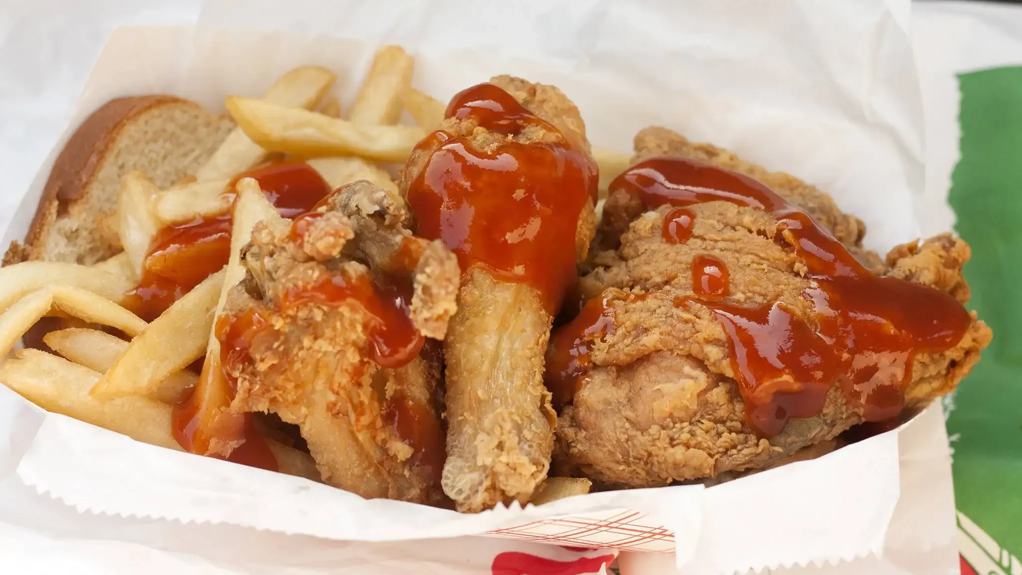 Southern fried chicken with fries and sauce