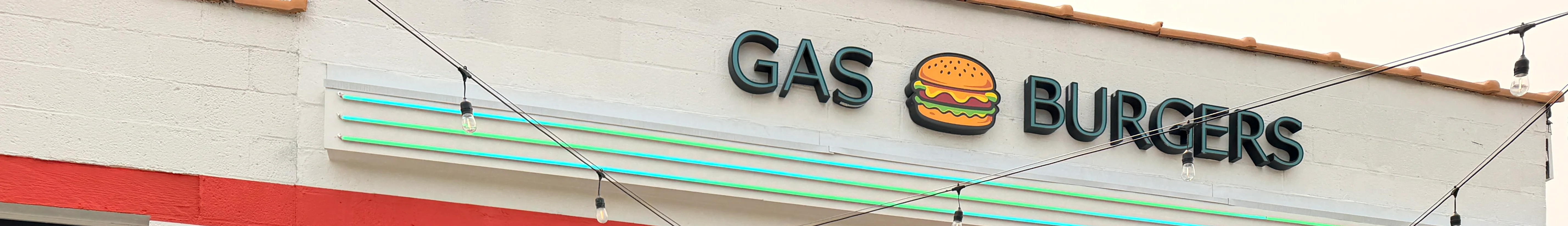 Team of staff in front of Gas Burgers restaurant