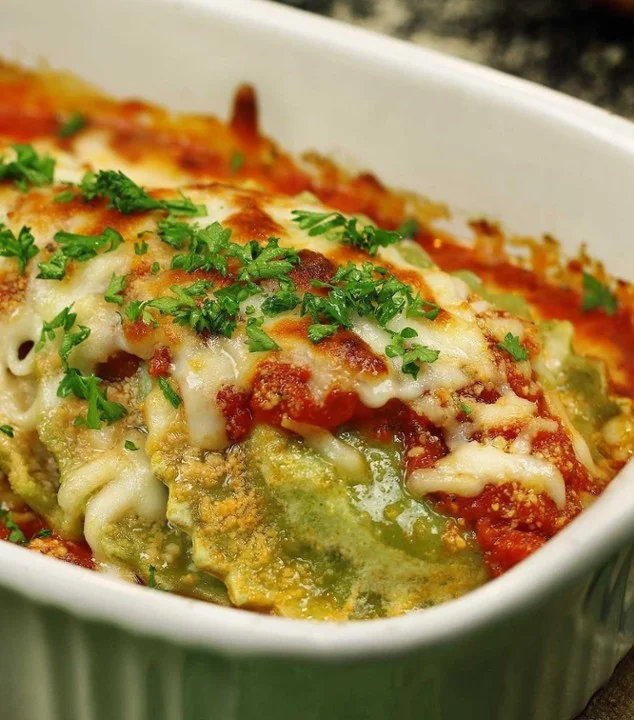 Baked Italian ravioli with marinara sauce and cheese