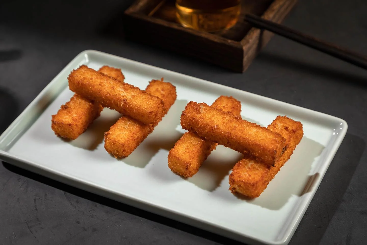 Crispy Japanese korokke served on a white plate