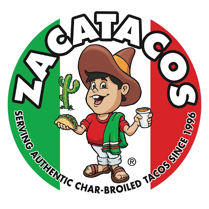Delicious tacos served on a wooden table with fresh ingredients.