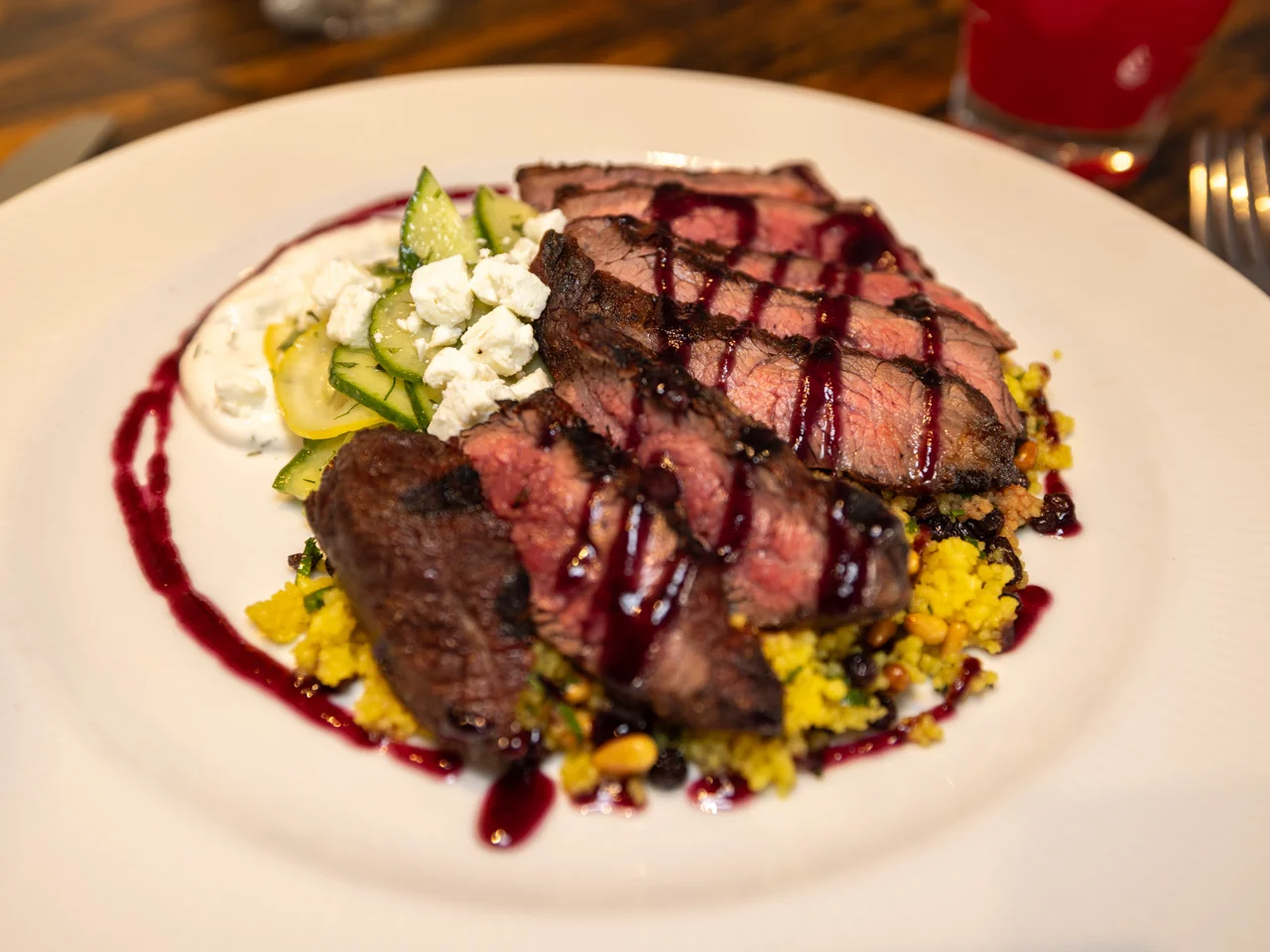 Bison Ribeye funeral potatoes, garlic-parmesan roasted broccolini, A1 demi glace