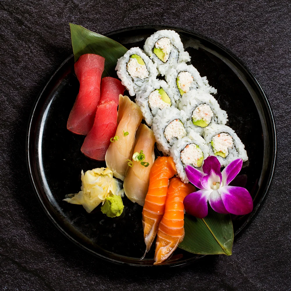 Assorted Japanese sushi platter with fresh fish and rolls