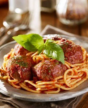 Classic Italian spaghetti and meatballs with marinara sauce
