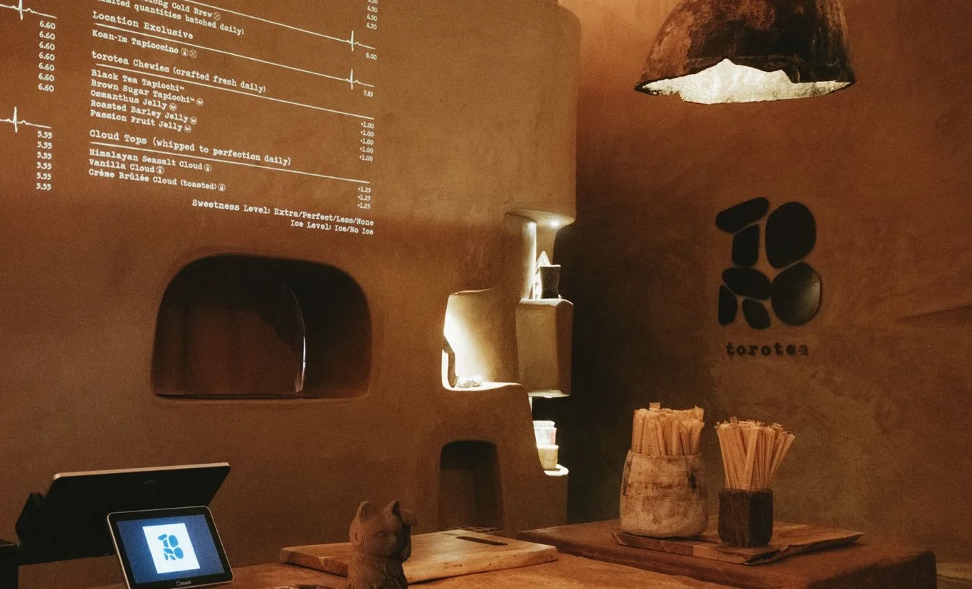 Cozy tea shop interior with menu and rustic decor