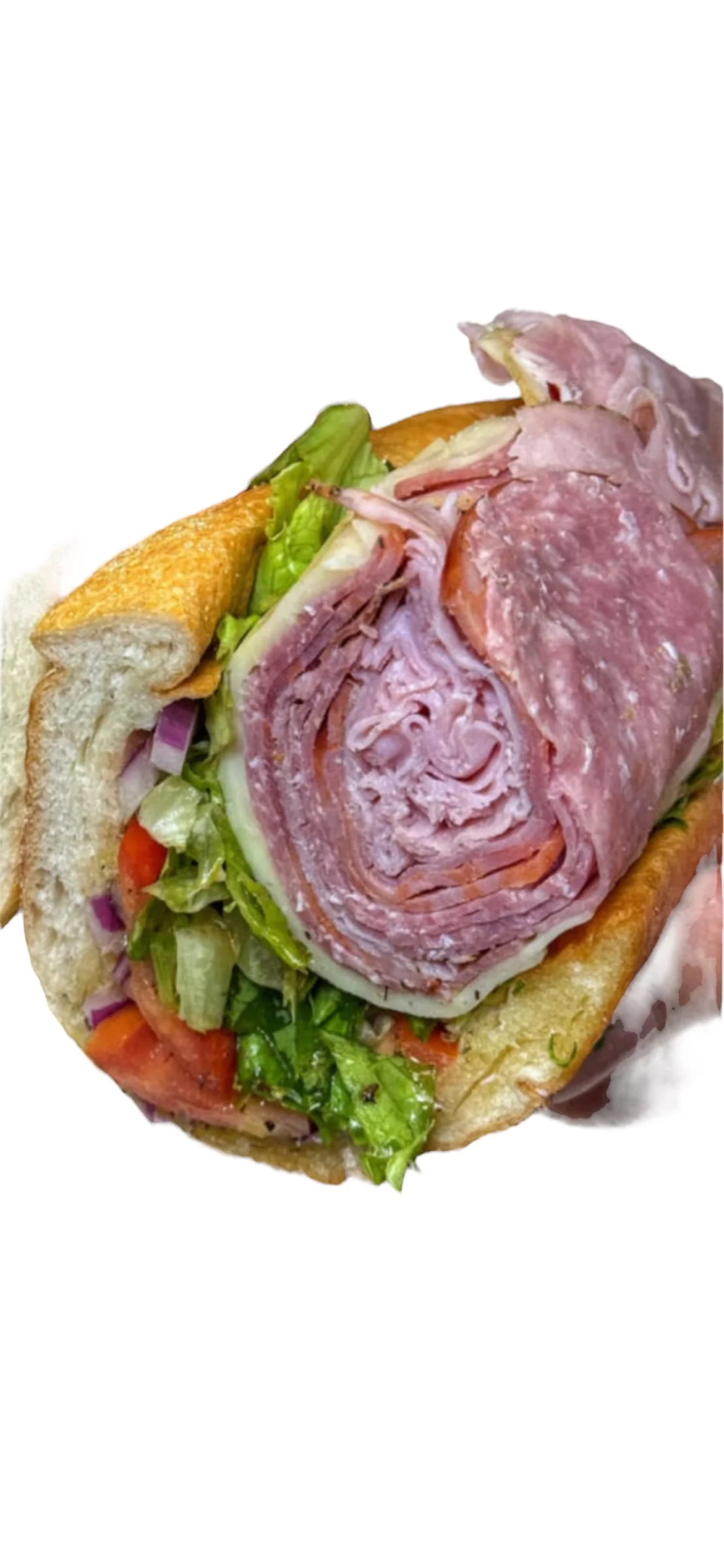 Italian sub sandwich with layers of meats and fresh vegetables