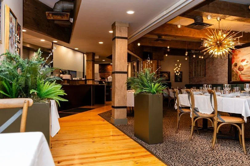 Cozy restaurant interior with modern decor and warm lighting