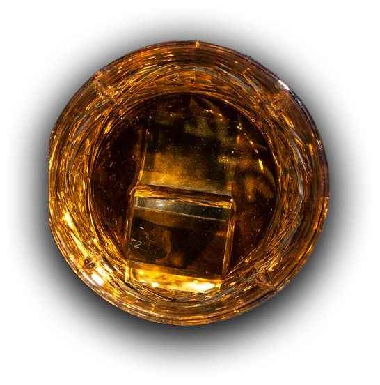 Whiskey on the rocks in a crystal tumbler