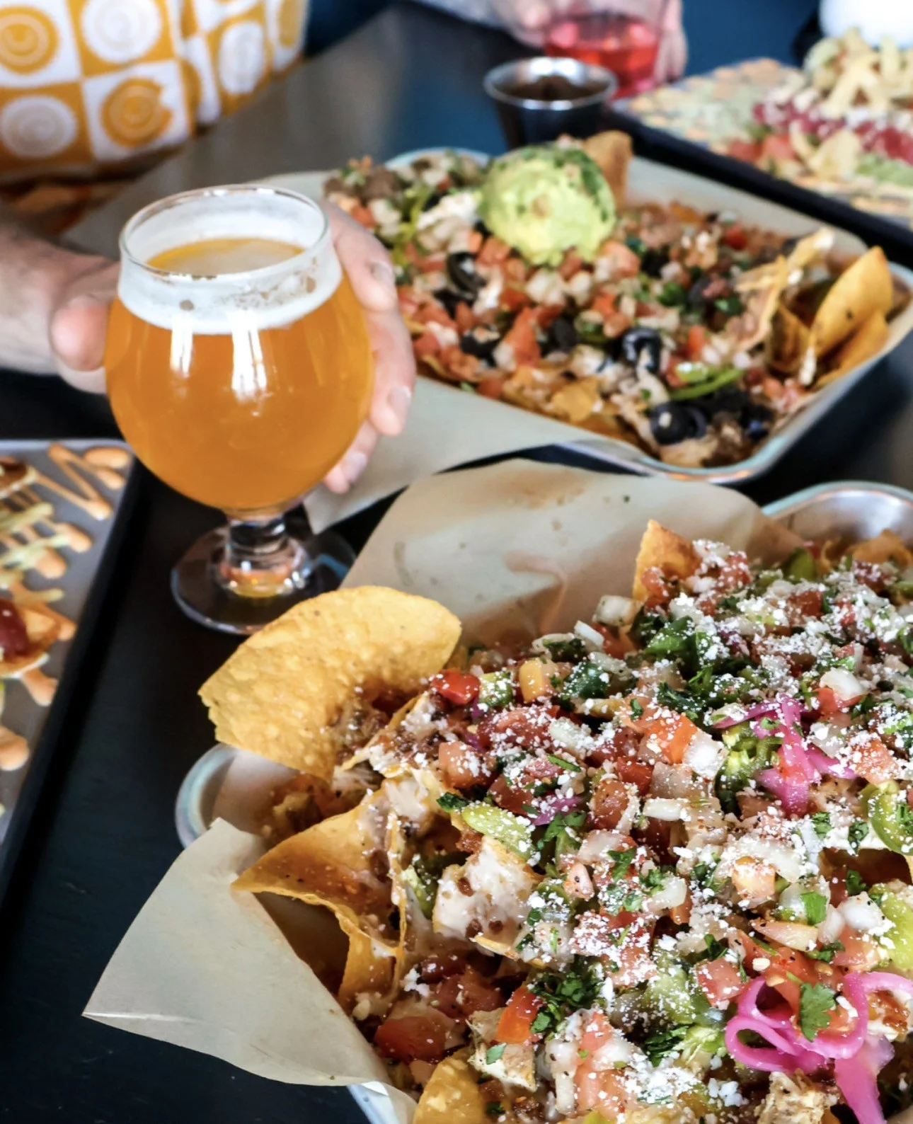 Loaded nachos topped with fresh ingredients