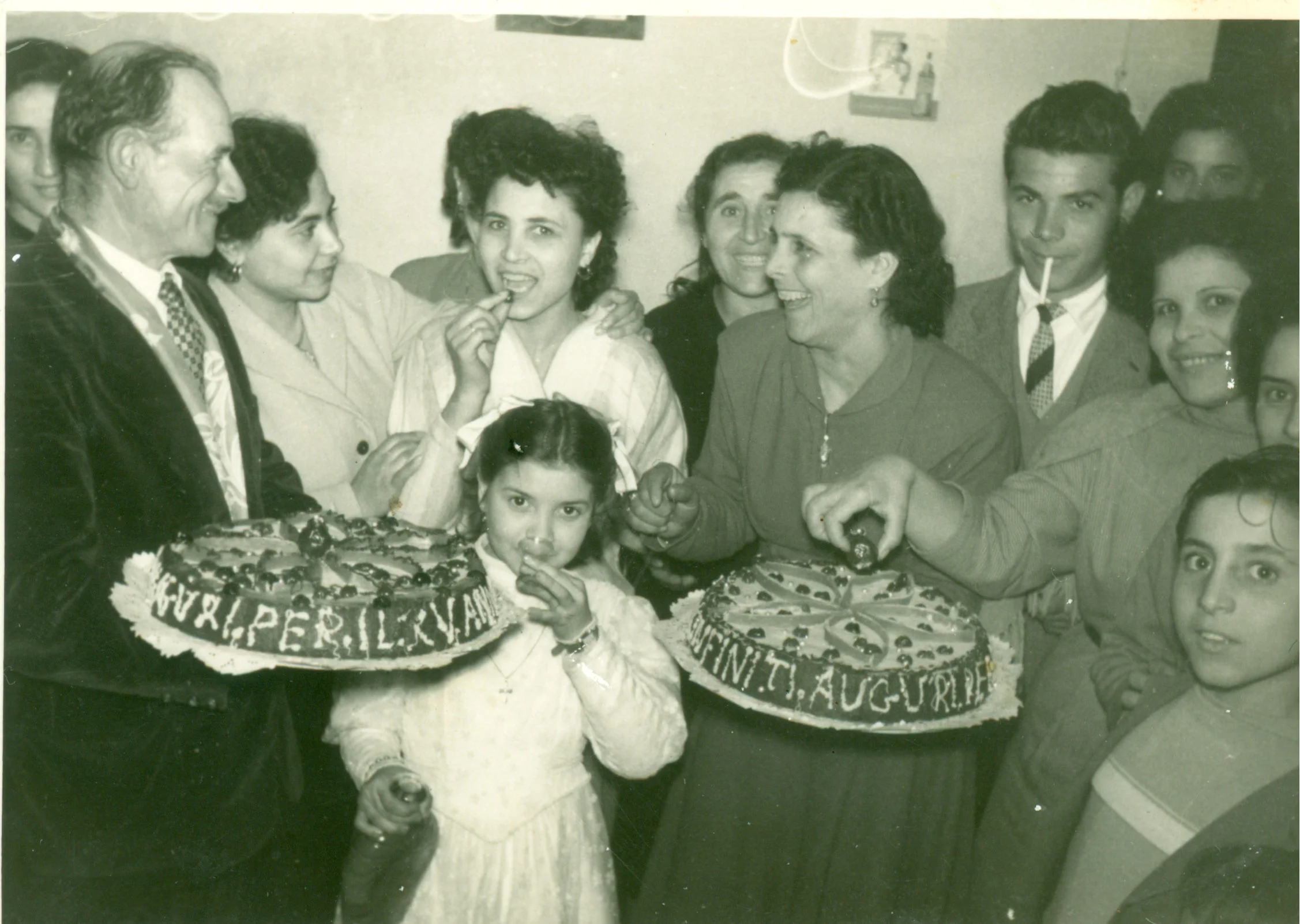 Celebratory gathering with cakes and joyful guests