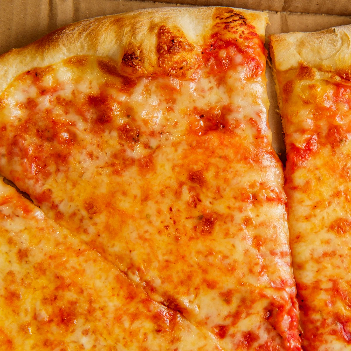Classic cheese pizza with golden crust and melted cheese