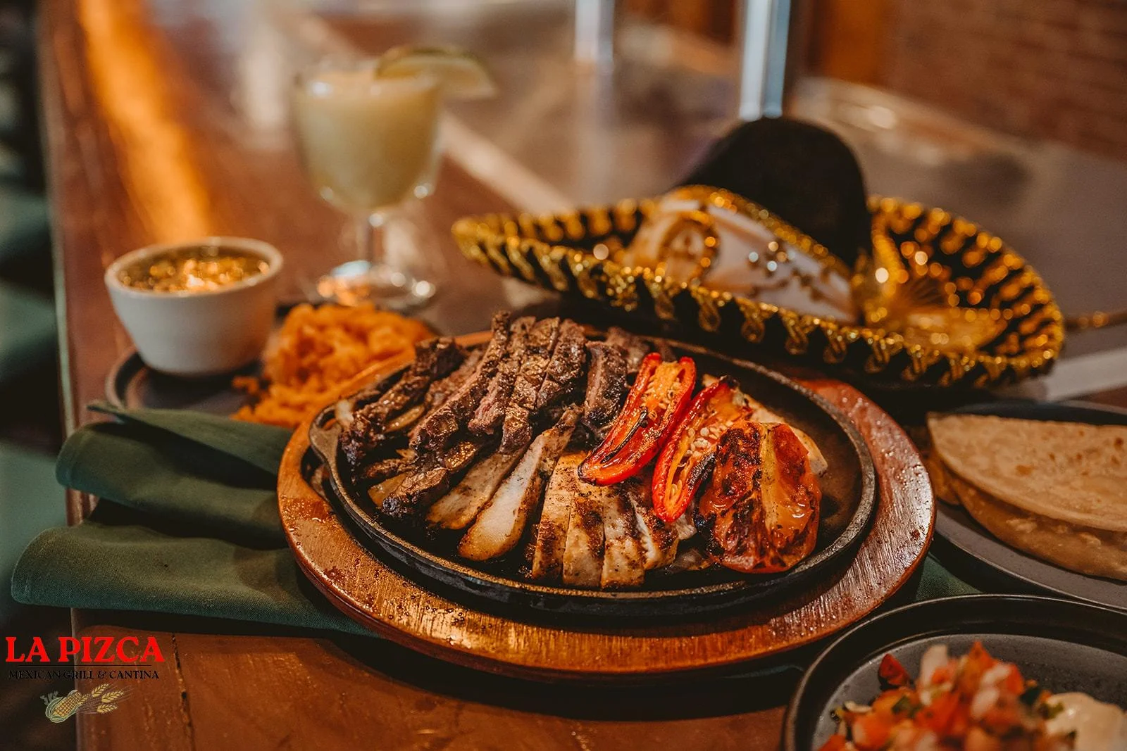 Sizzling fajitas served with grilled meats and vegetables