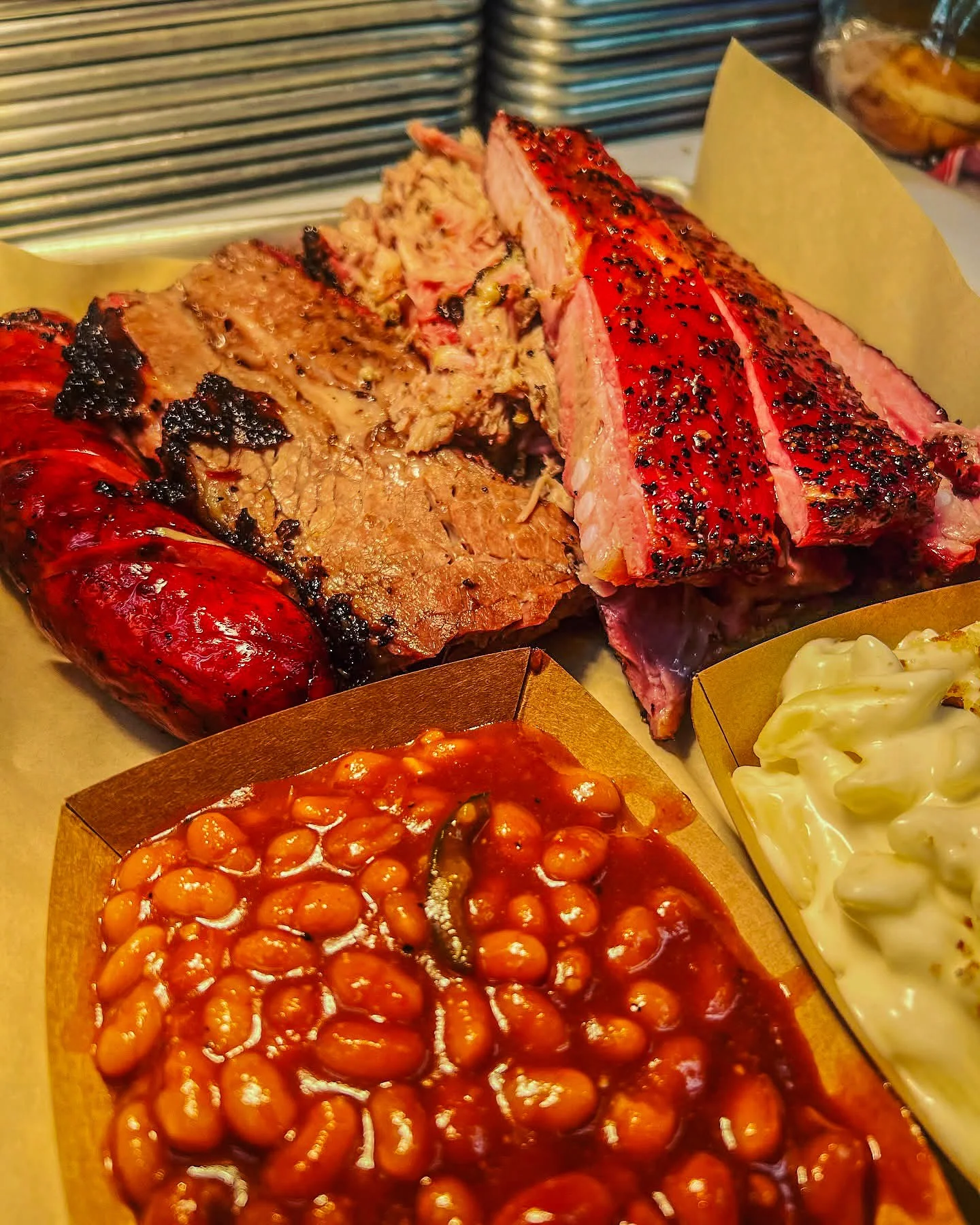 Texas-style barbecue platter with brisket and sausage