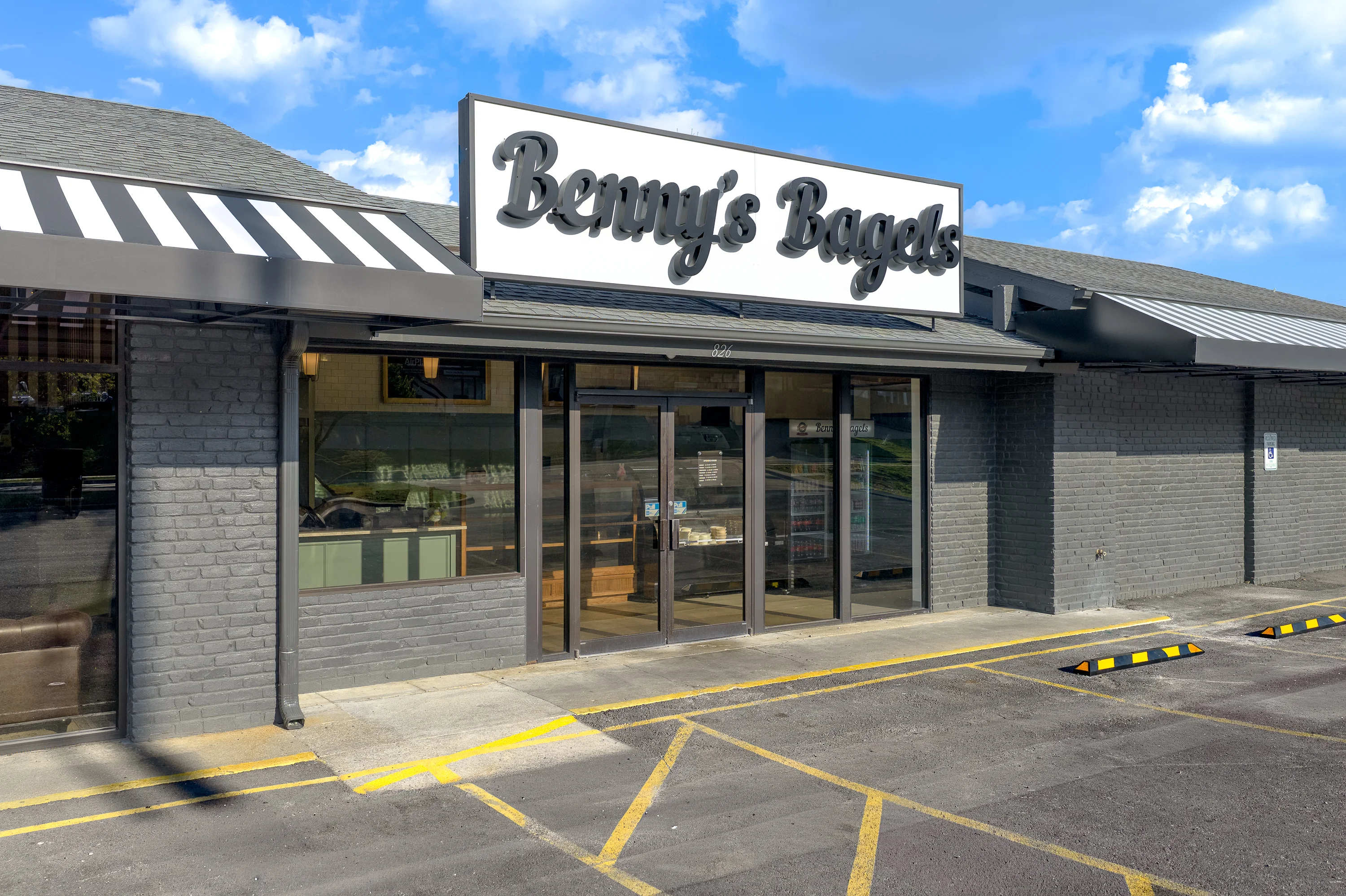 Exterior view of Benny's restaurant with outdoor seating and vibrant decor.