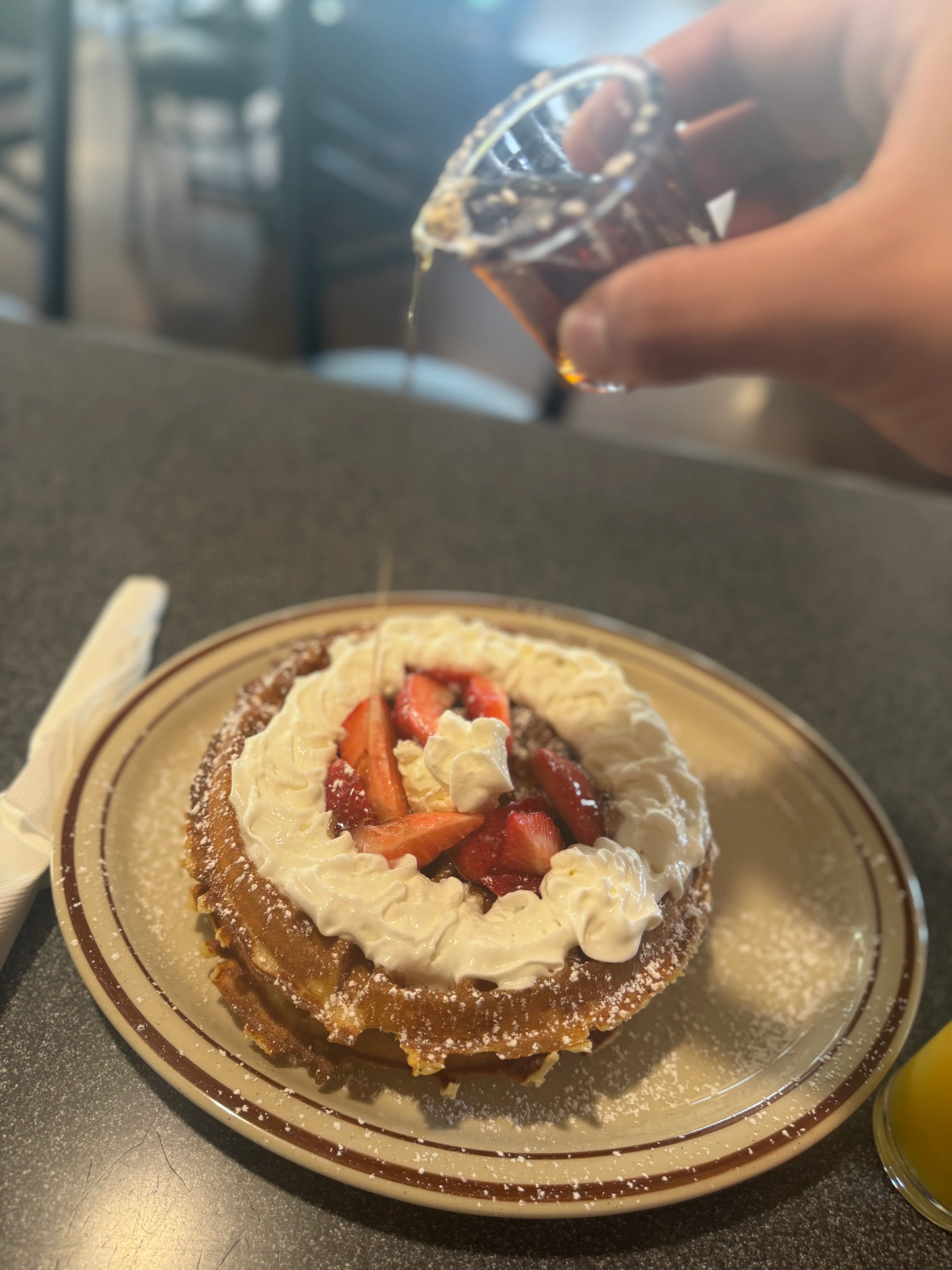 Fluffy strawberry shortcake topped with whipped cream
