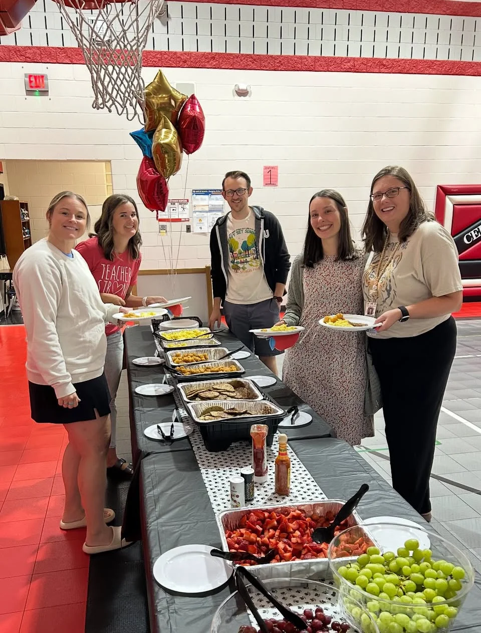 Group enjoying a buffet with various dishes at a festive gathering