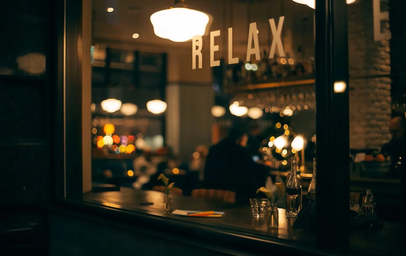 A vibrant restaurant interior with colorful decor and inviting seating.