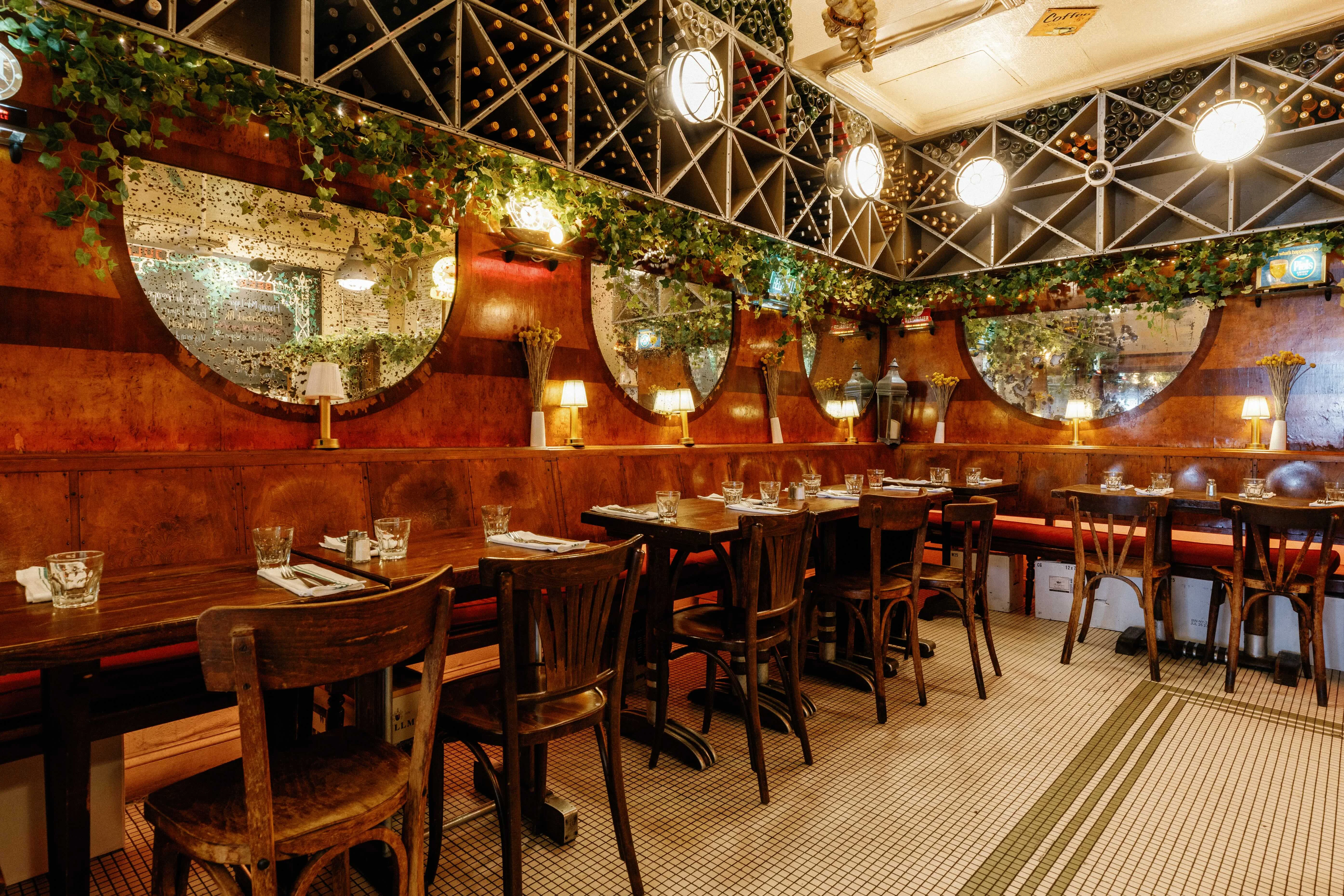 Cozy restaurant interior with wooden decor and warm lighting
