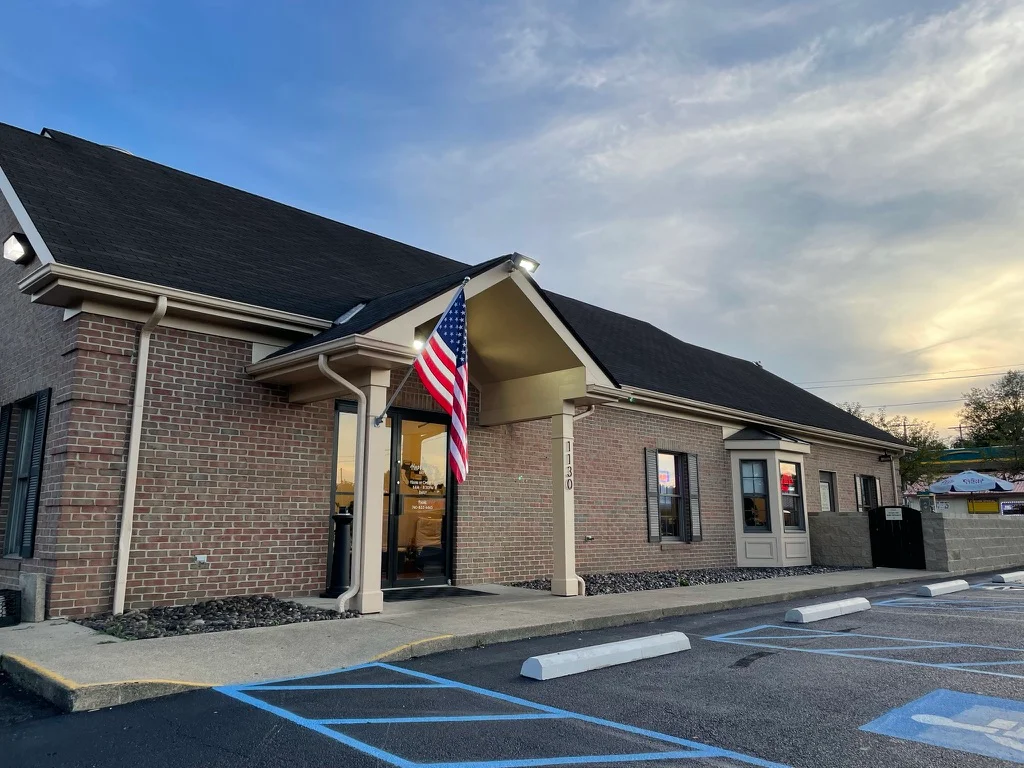 Exterior view of a restaurant with American flag