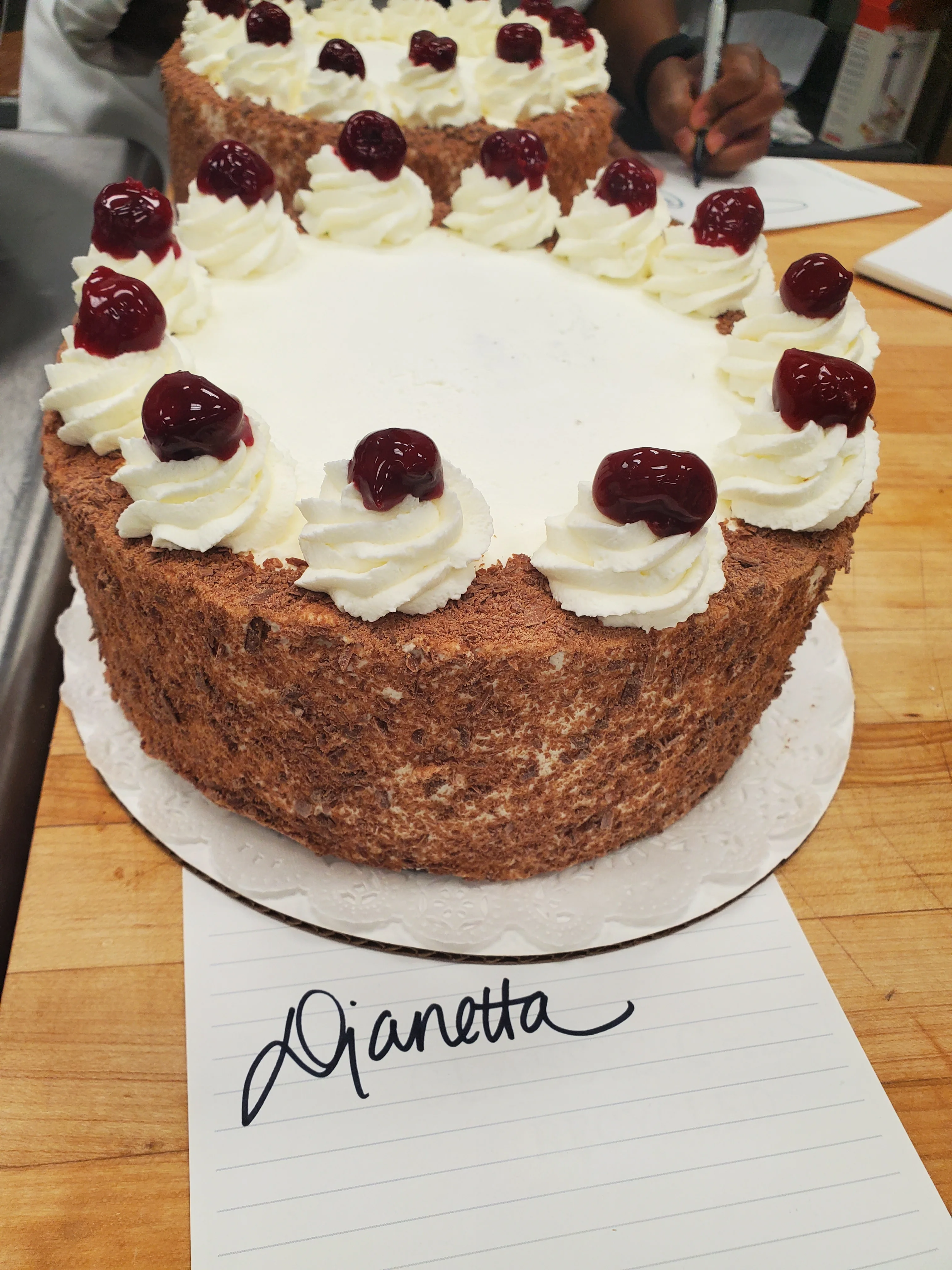 Classic German Black Forest cake with cherries and whipped cream