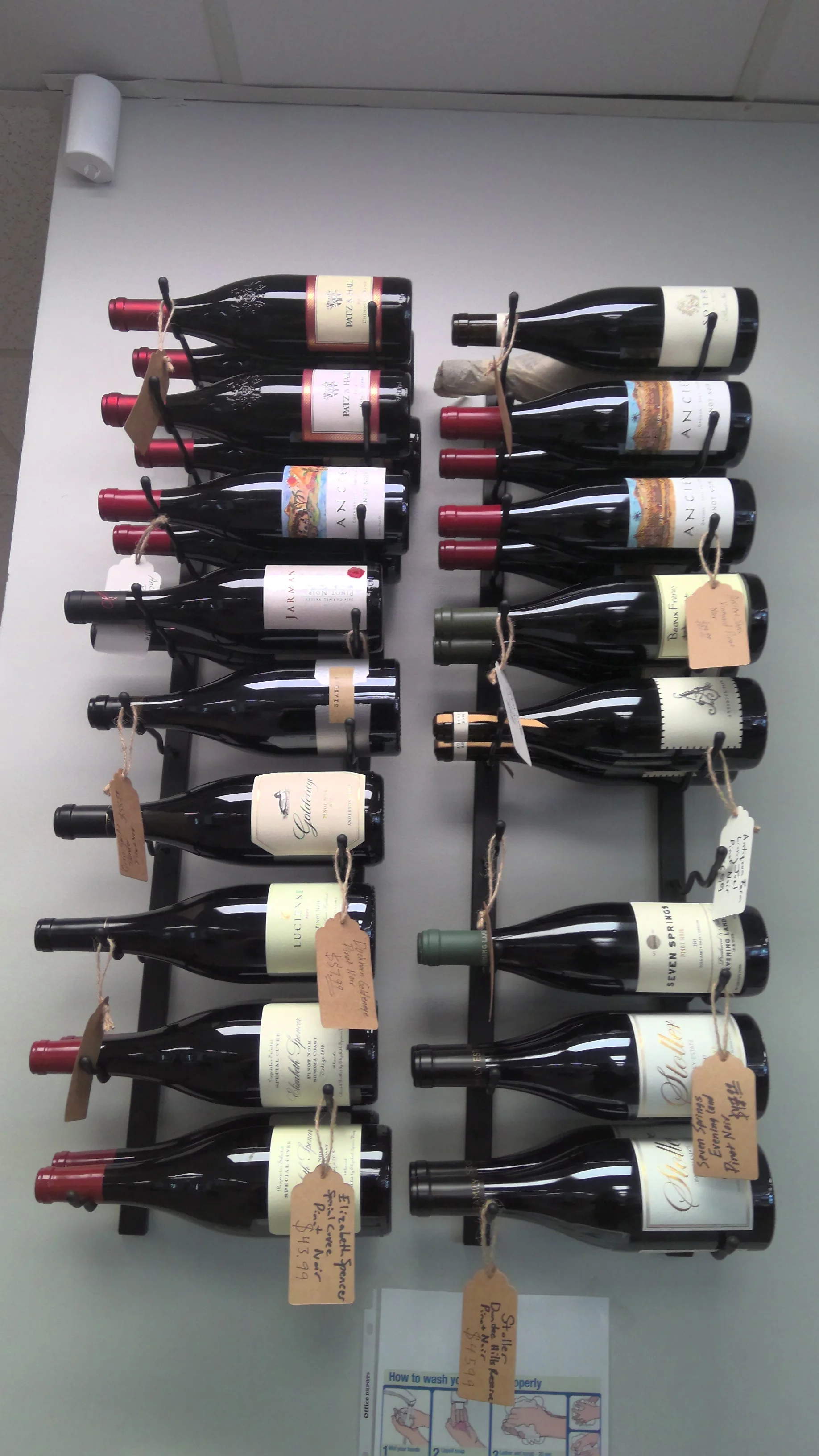 Wine bottles displayed on a rack in a restaurant