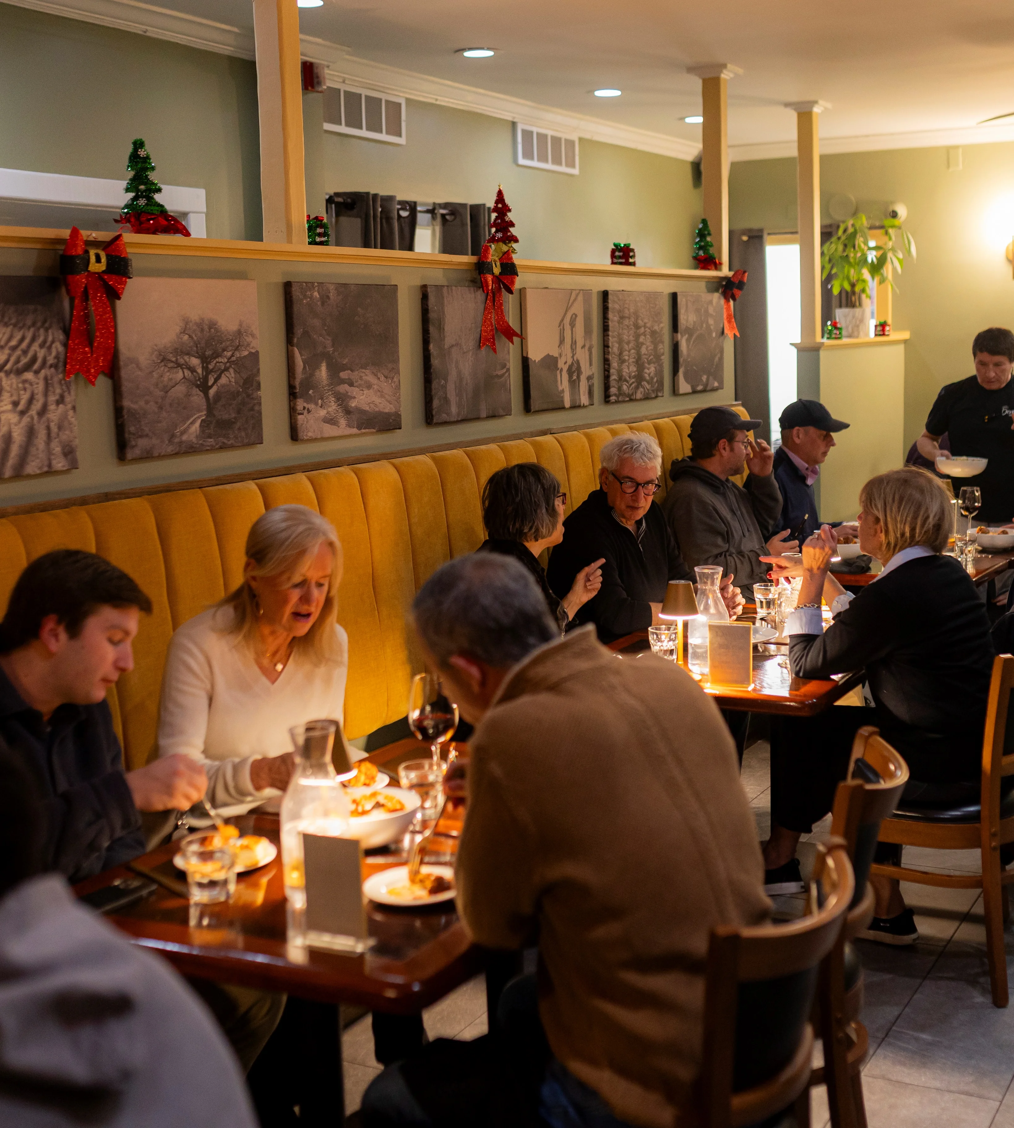 Cozy restaurant interior with warm lighting and festive decor