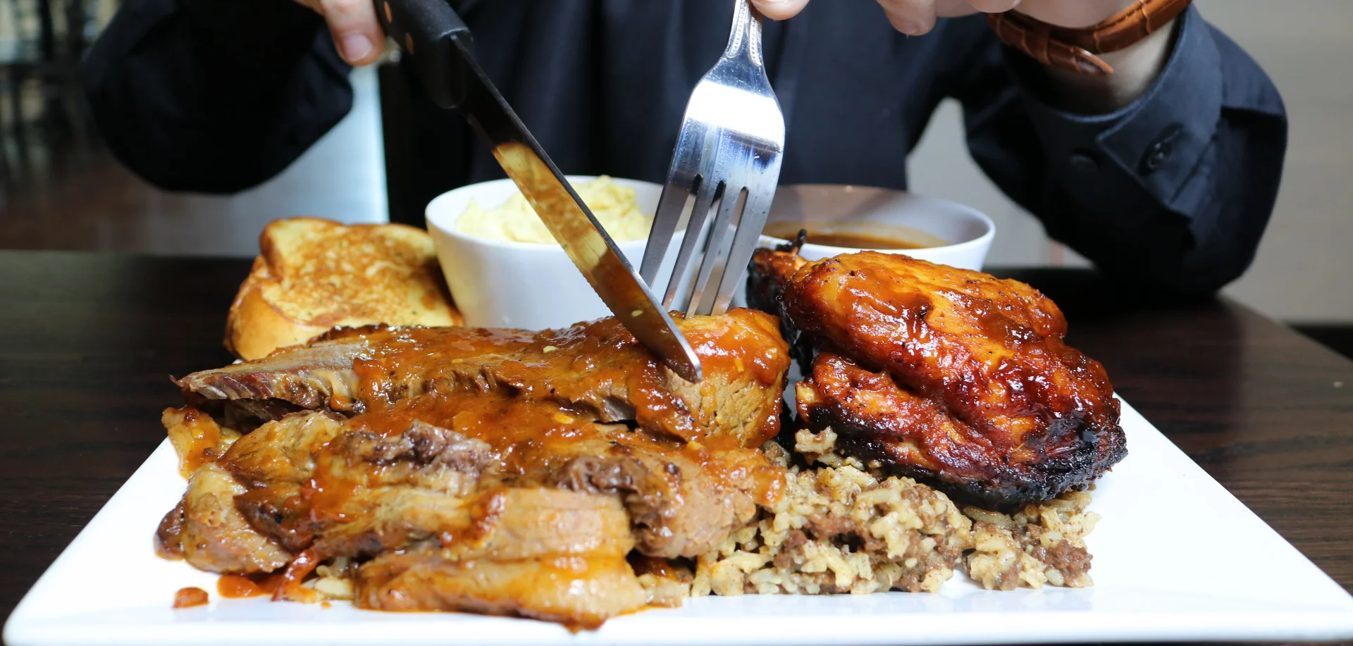 Plate of Southern barbecue with brisket and chicken