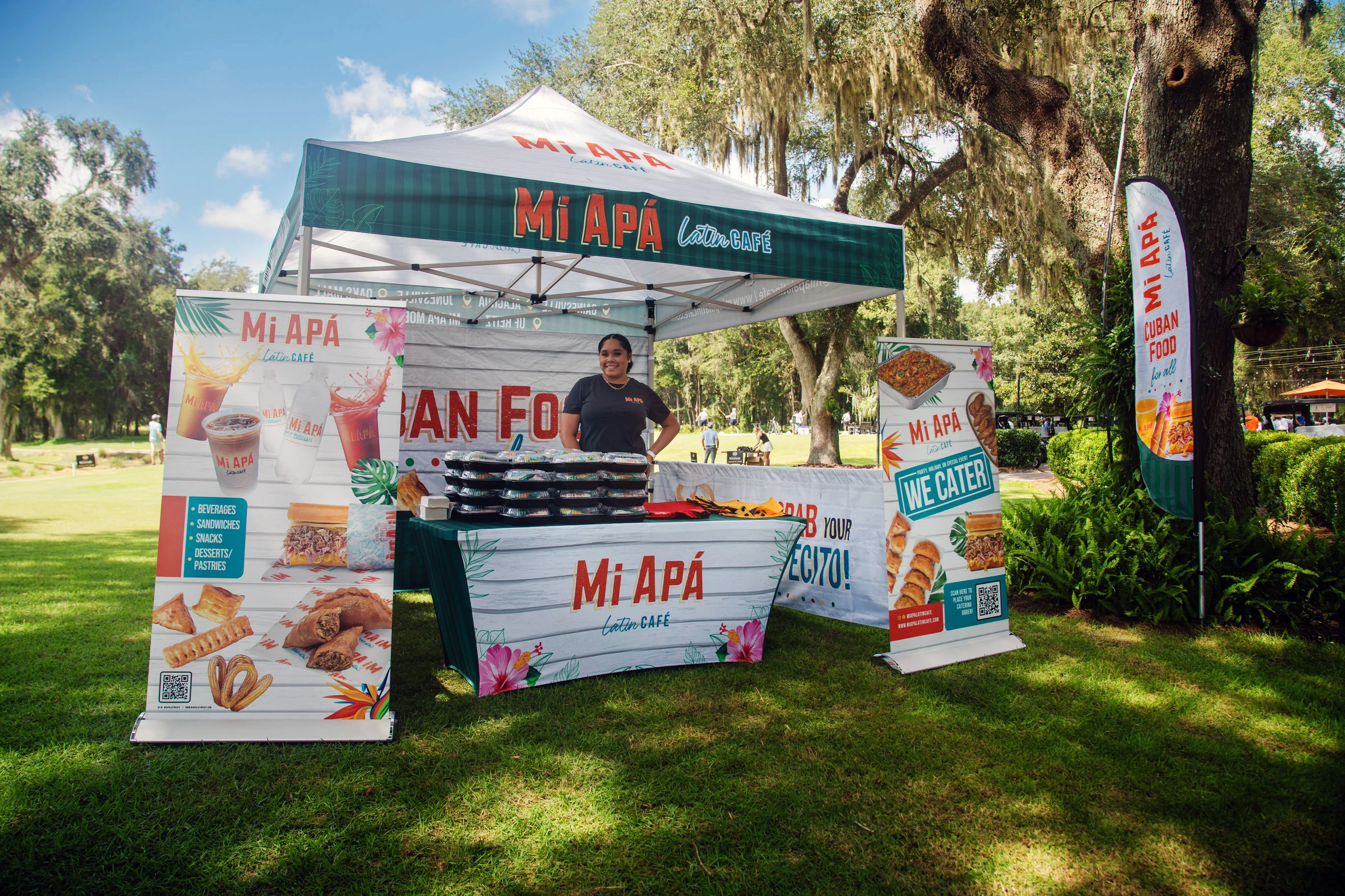 Cuban food stall featuring traditional dishes at a festival