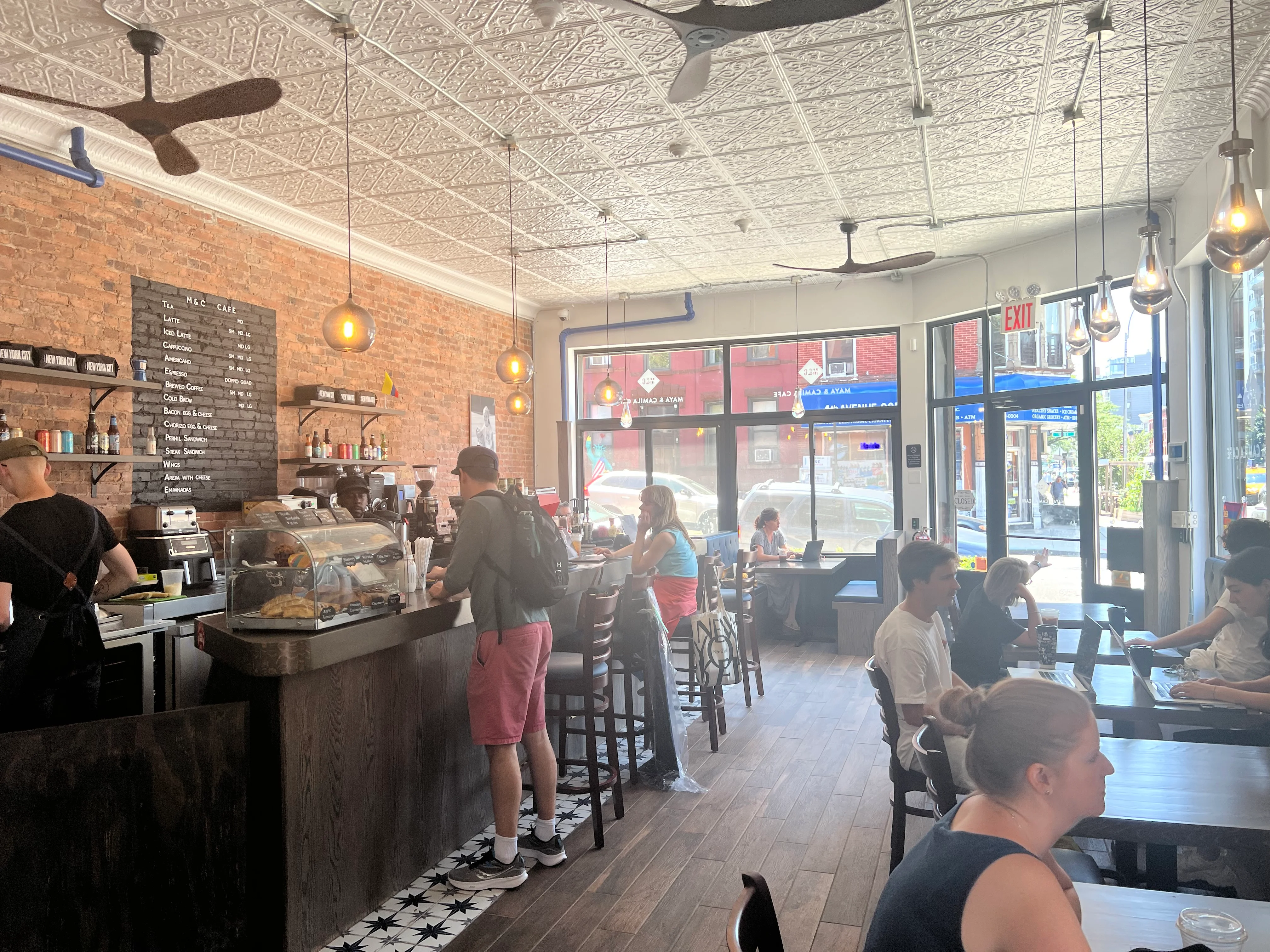Cozy café interior with exposed brick and modern lighting