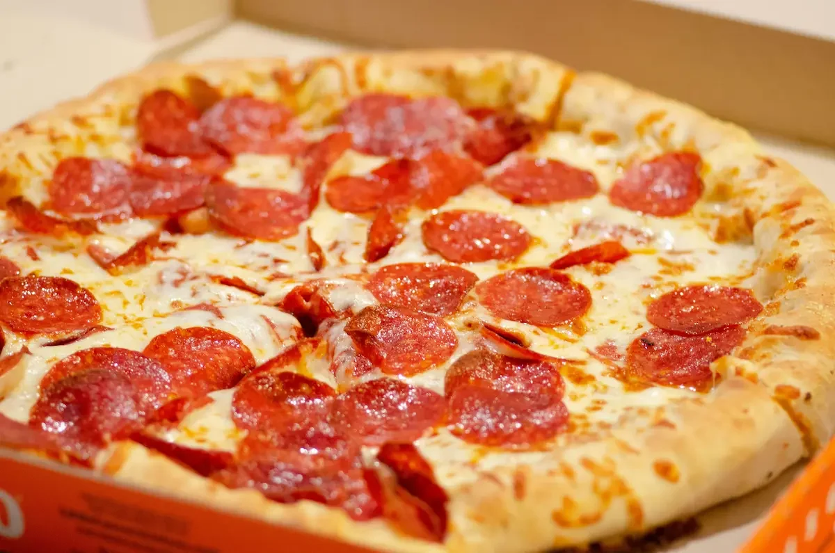 Pepperoni pizza with melted cheese and golden crust
