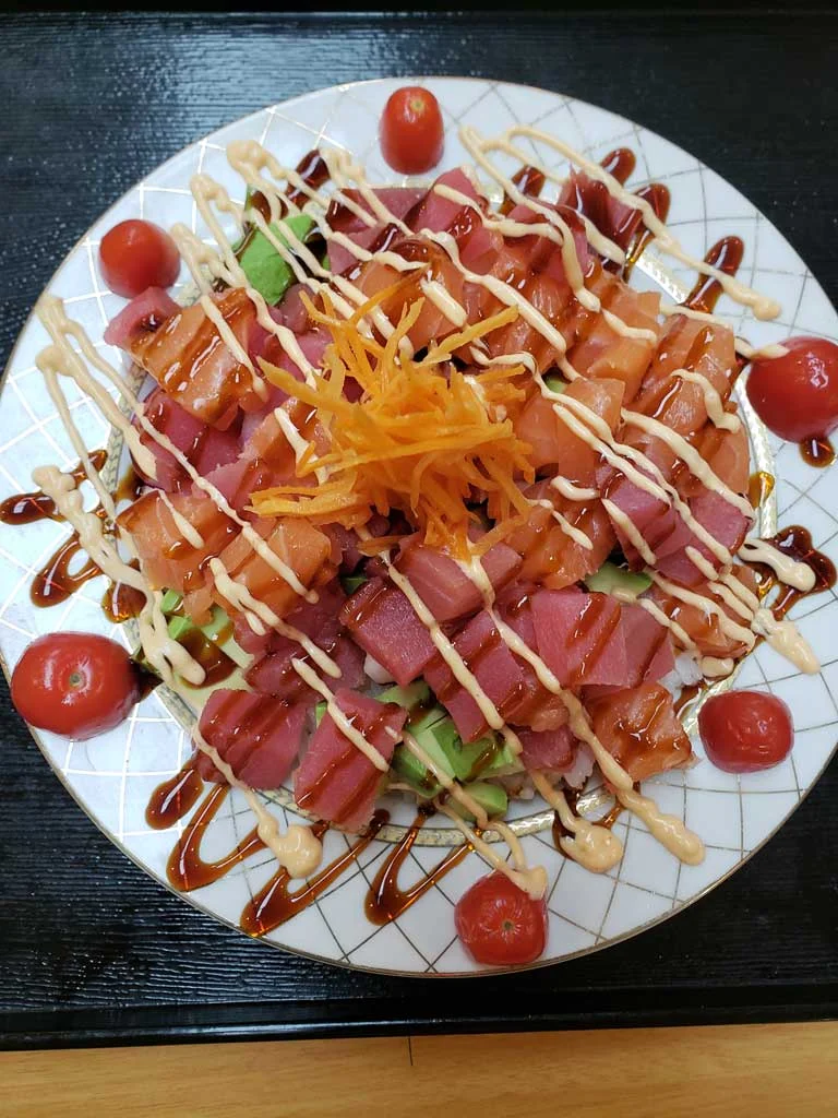 A bowl of tuna and salmon poke