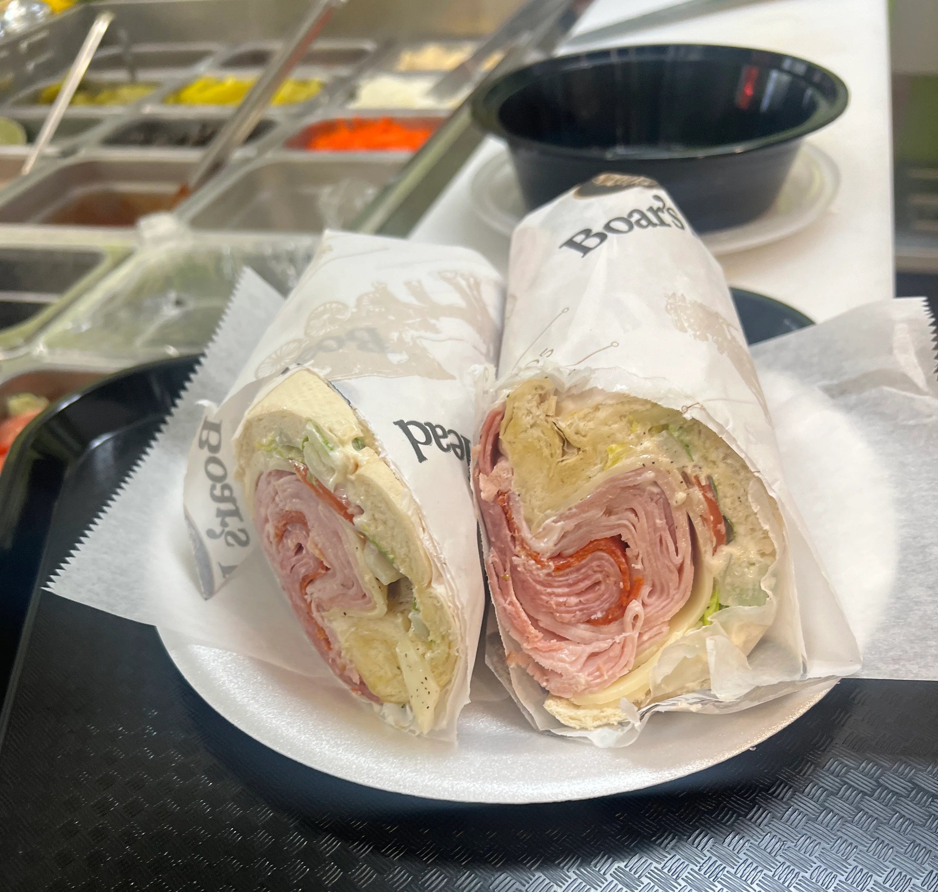 Italian deli wrap with assorted meats and vegetables