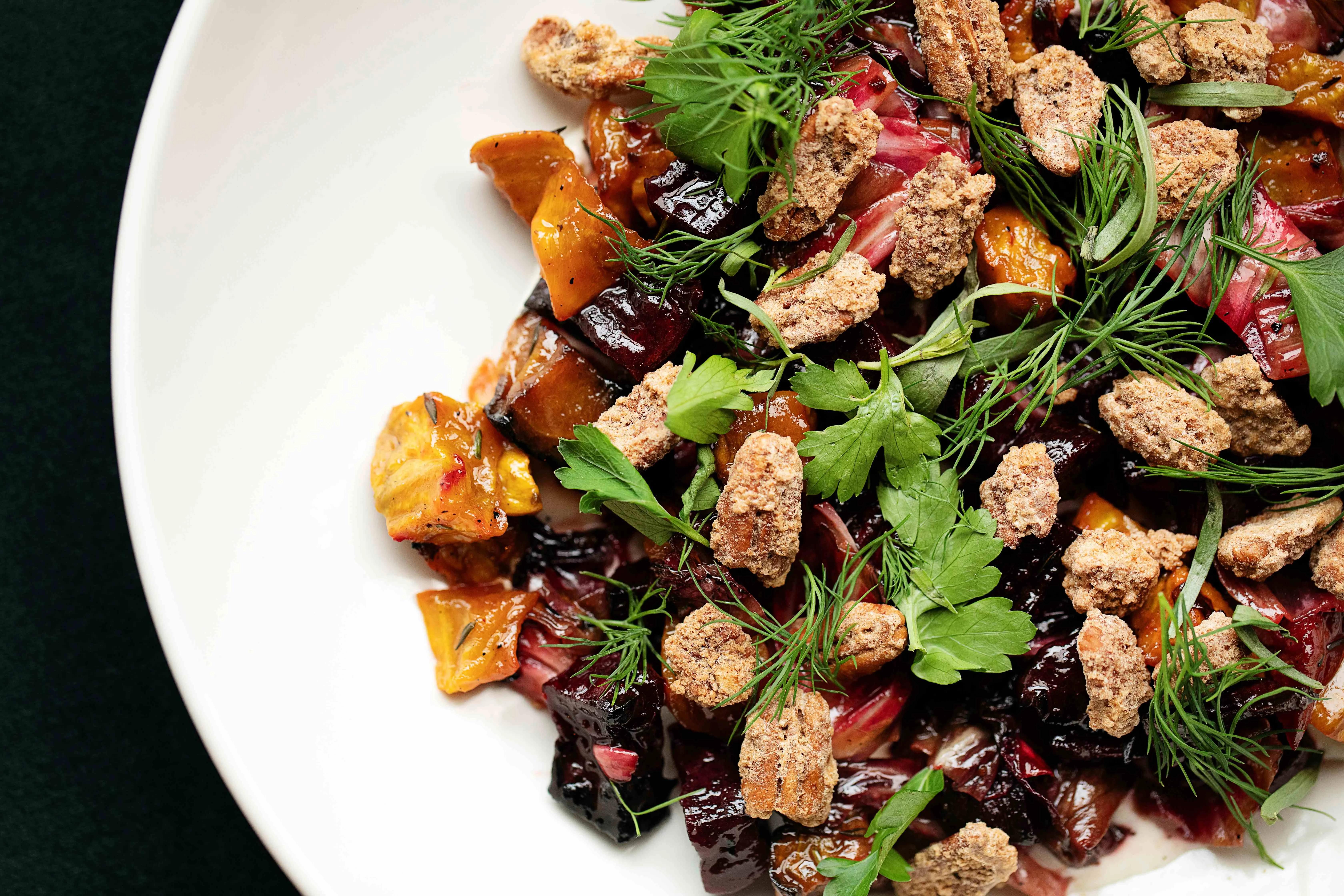Colorful roasted vegetable salad with herbs