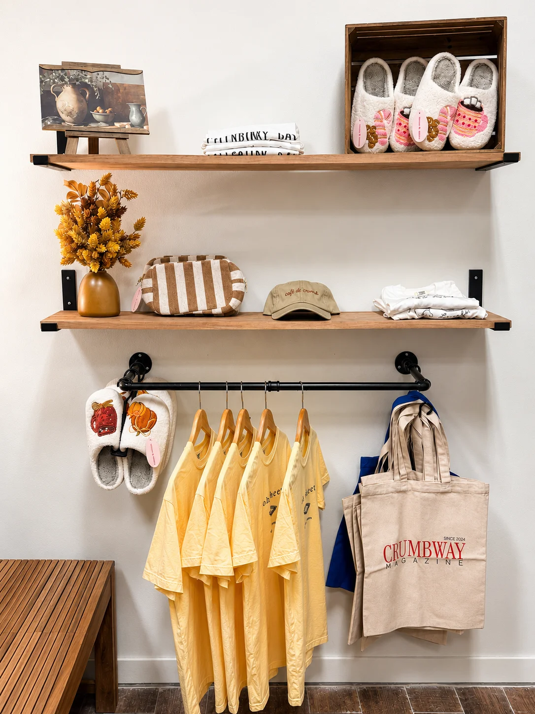 Charming retail display with cozy apparel and decor