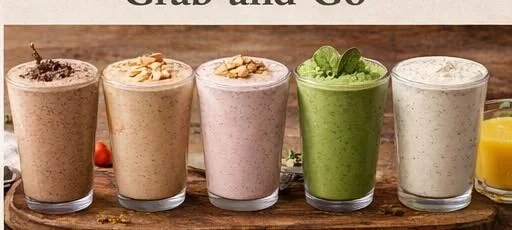 A variety of smoothies in tall glasses, showcasing different flavors such as chocolate, vanilla, strawberry, and green smoothie options, perfect for on-the-go meals.