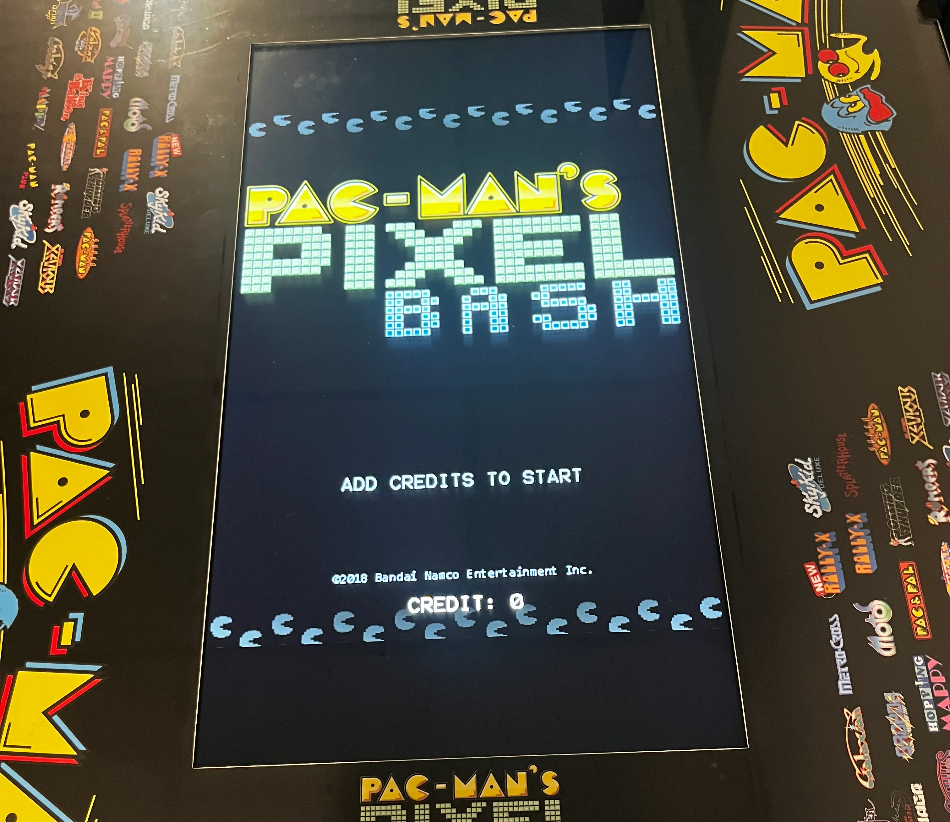 Pac-Man's Pixel Bash arcade game screen