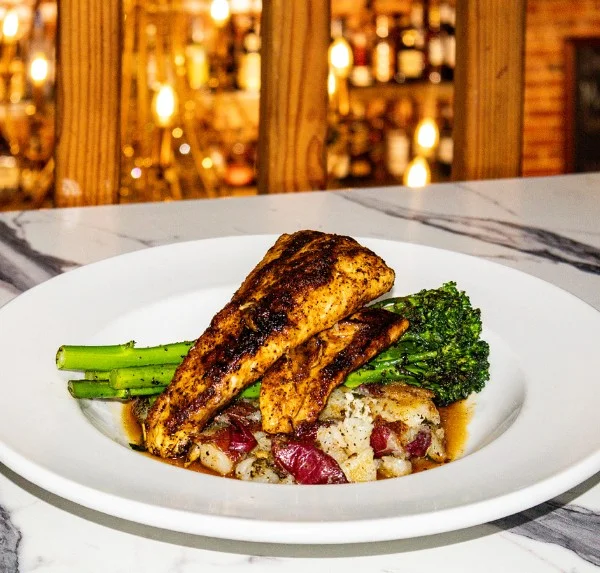 Blackened fish fillet with asparagus and mashed potatoes