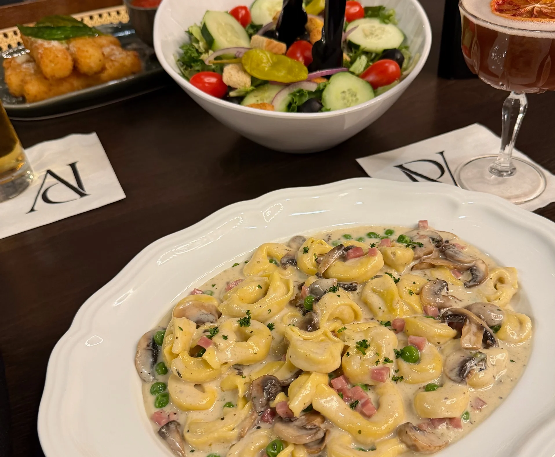 Creamy Italian tortellini pasta dish with mushrooms