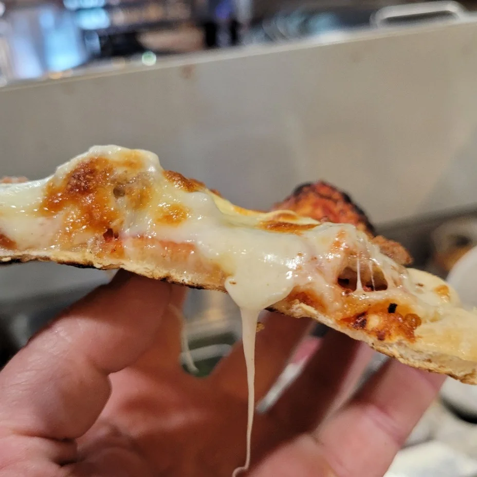 Thin Crust Pizza or Chicago's Tourist Pizza the Deep Dish