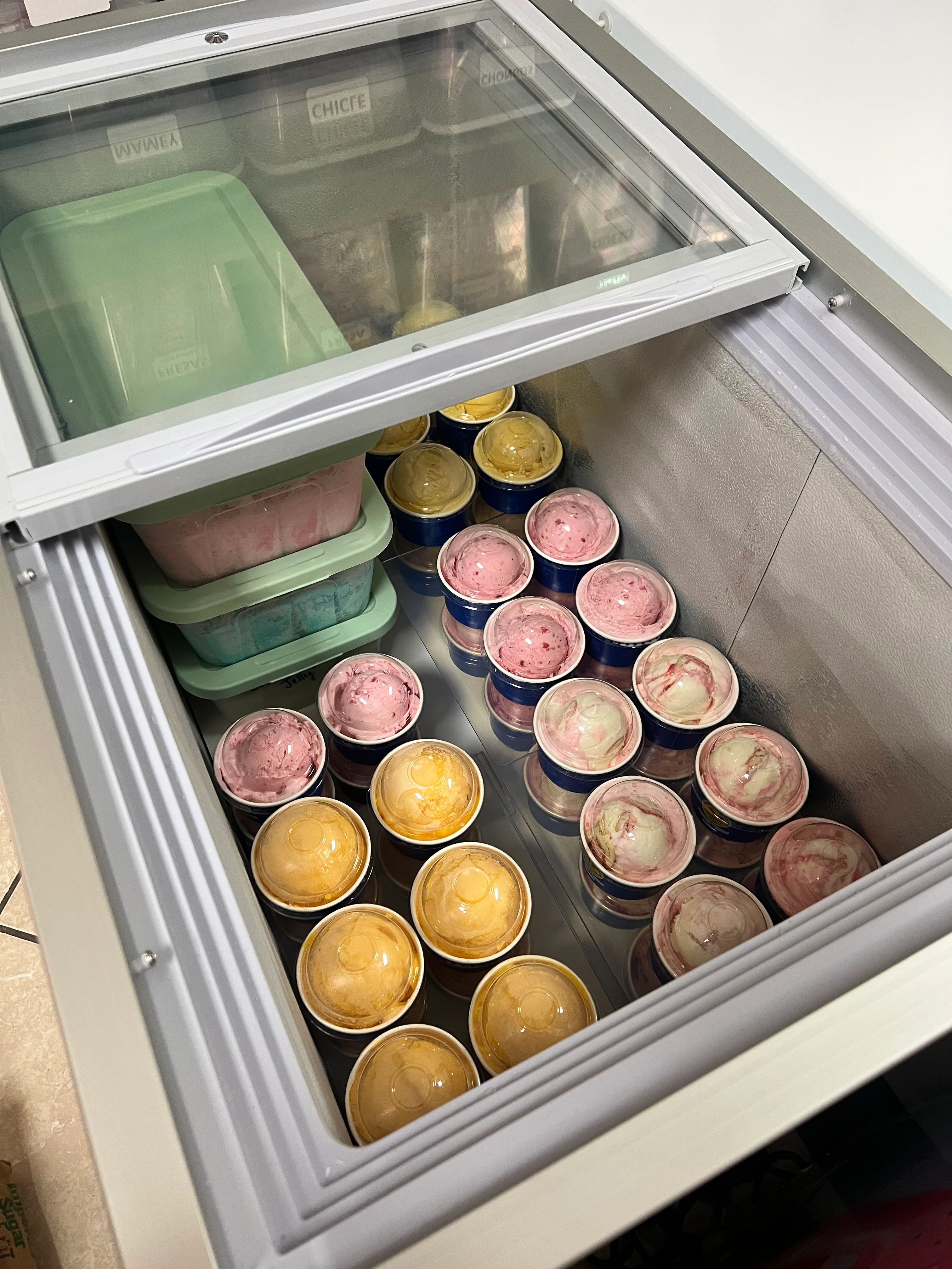 Colorful assortment of gelato in a display freezer